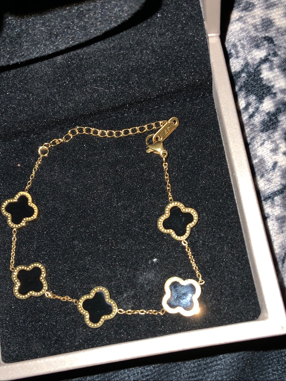 Gold Clover Link Bracelet with Black Inlay